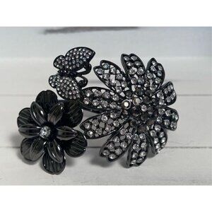 Black metal rhinestone/flower statement bracelet